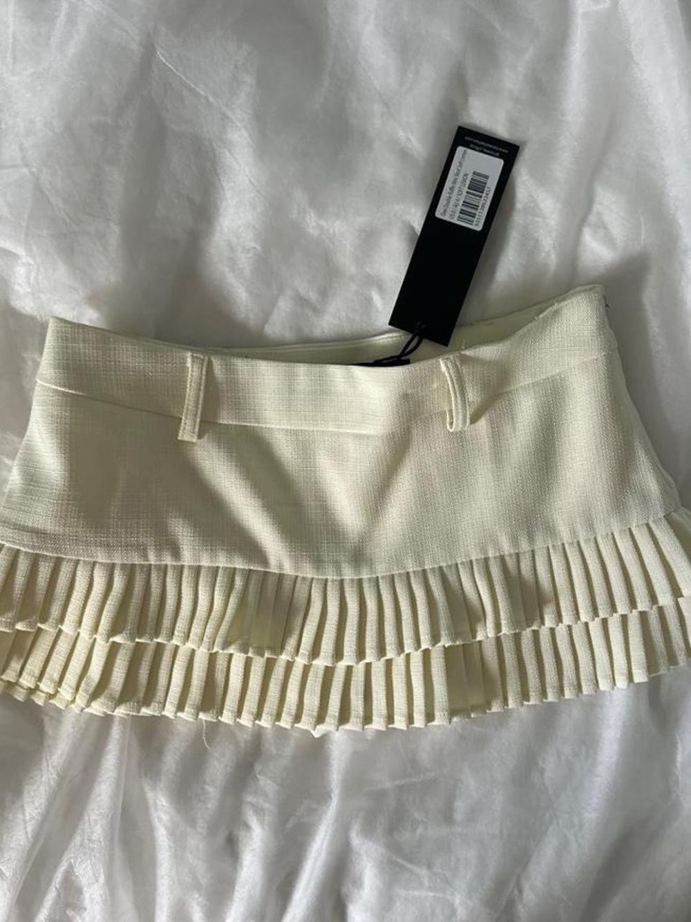 Lioness Pleated Mini Skirt in Cream XXS